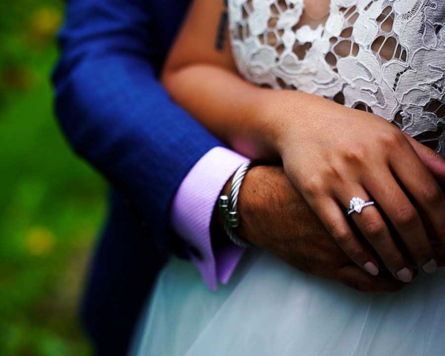 Bride-and-groom-holding-hands-at-Devon-micro-wedding