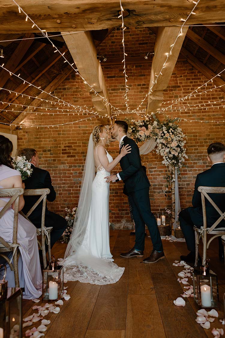 Spring wedding couple kiss