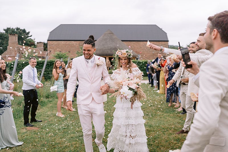 Devon_Wedding_Venue_Couple_Leaving_Confetti