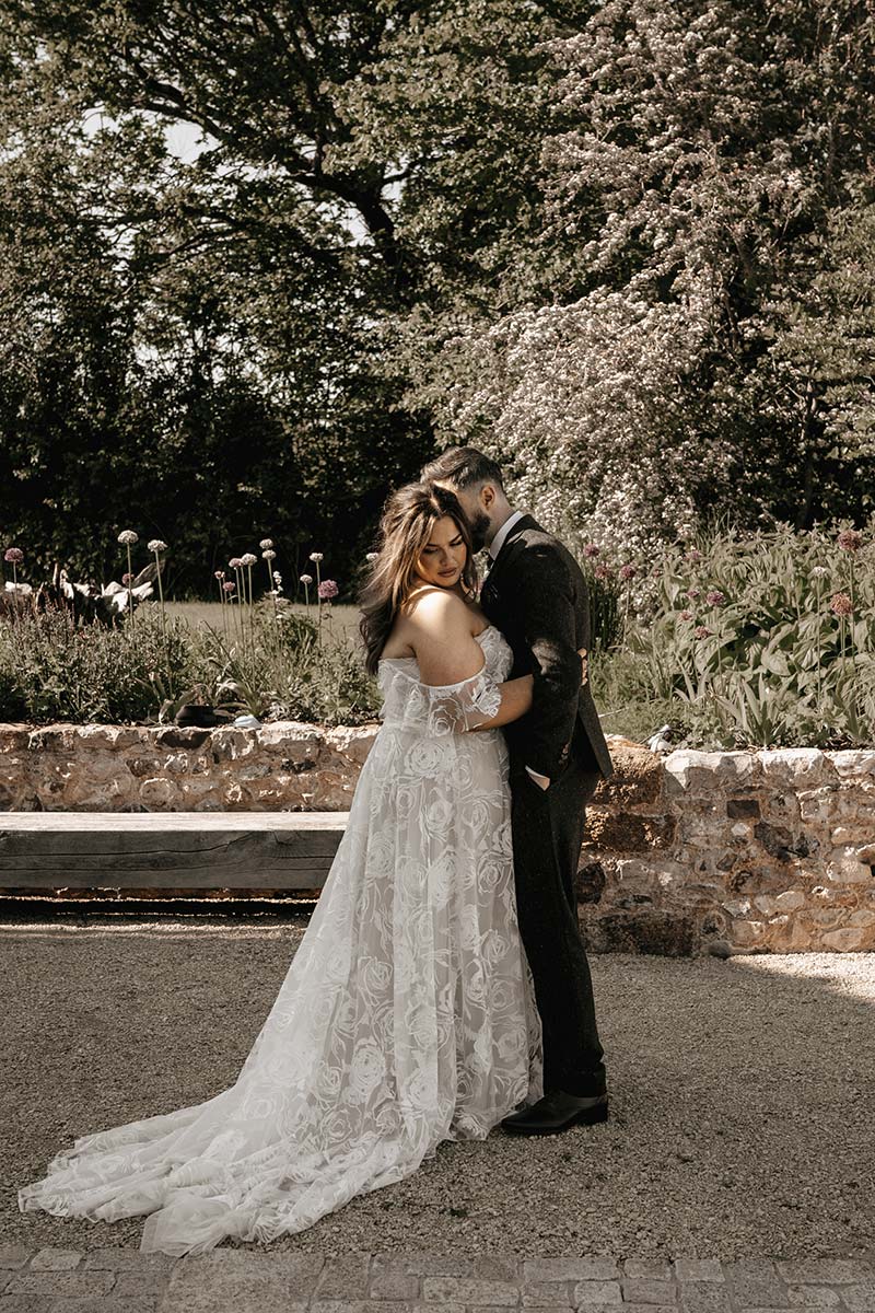 17-Bride-and-Groom-in-rural-garden-at-Devon-wedding-venue