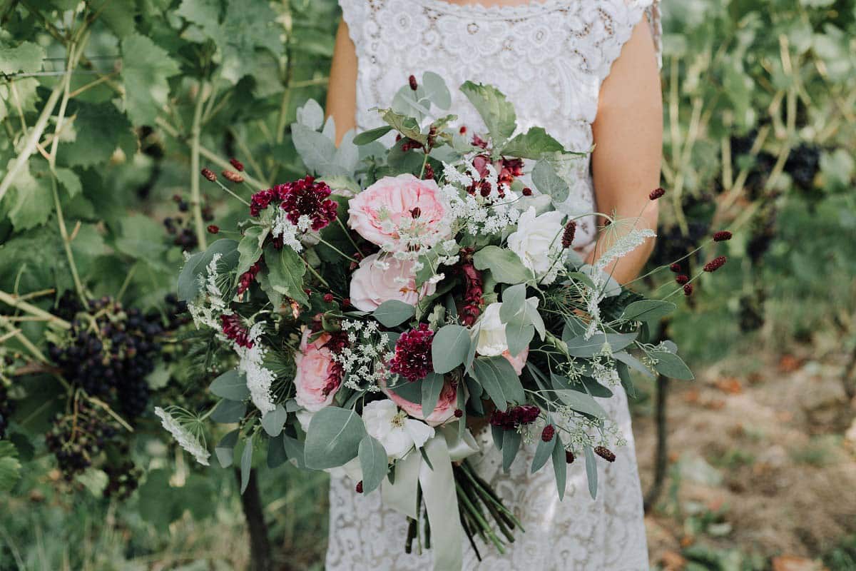 Bride-with-Bouquet-in-Vineyard