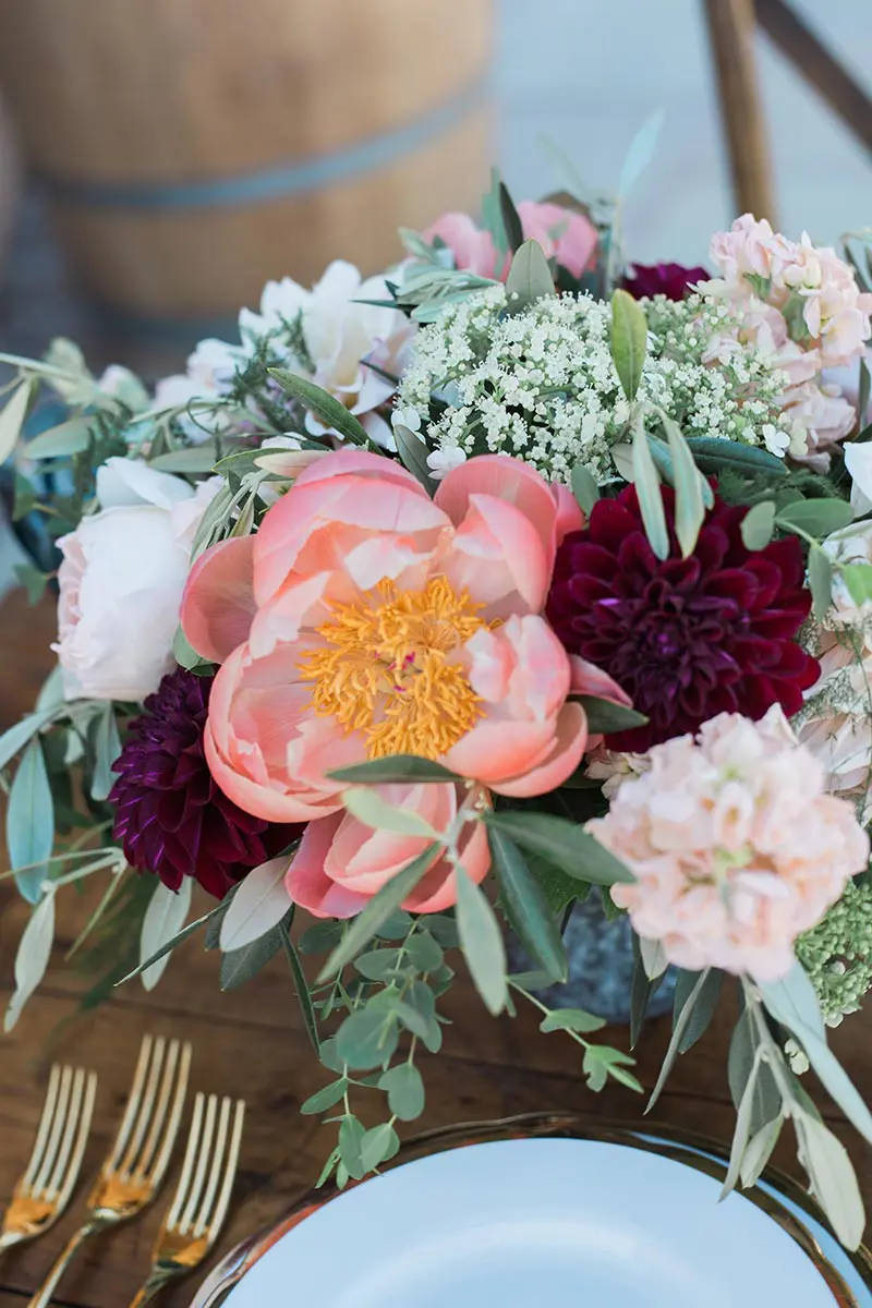 Floral table decorations in the intimate wedding venue in Devon