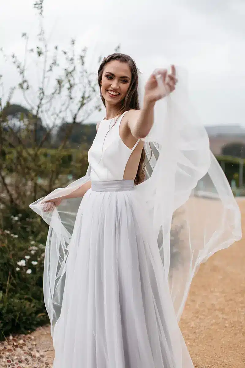 The bride on the terrace at the Brickhouse Vineyard wedding venue