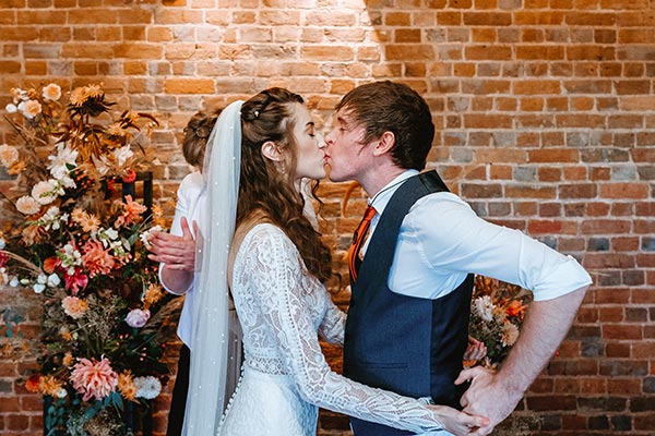 Autumn Vinyard Wedding Couple Kiss